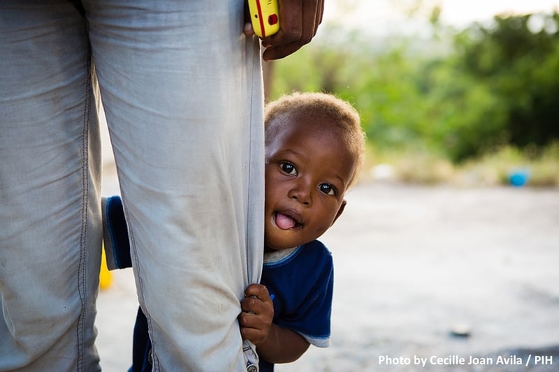 alt="child fighting starvation feeling better"