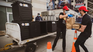 World Central Kitchen staff delivering meals