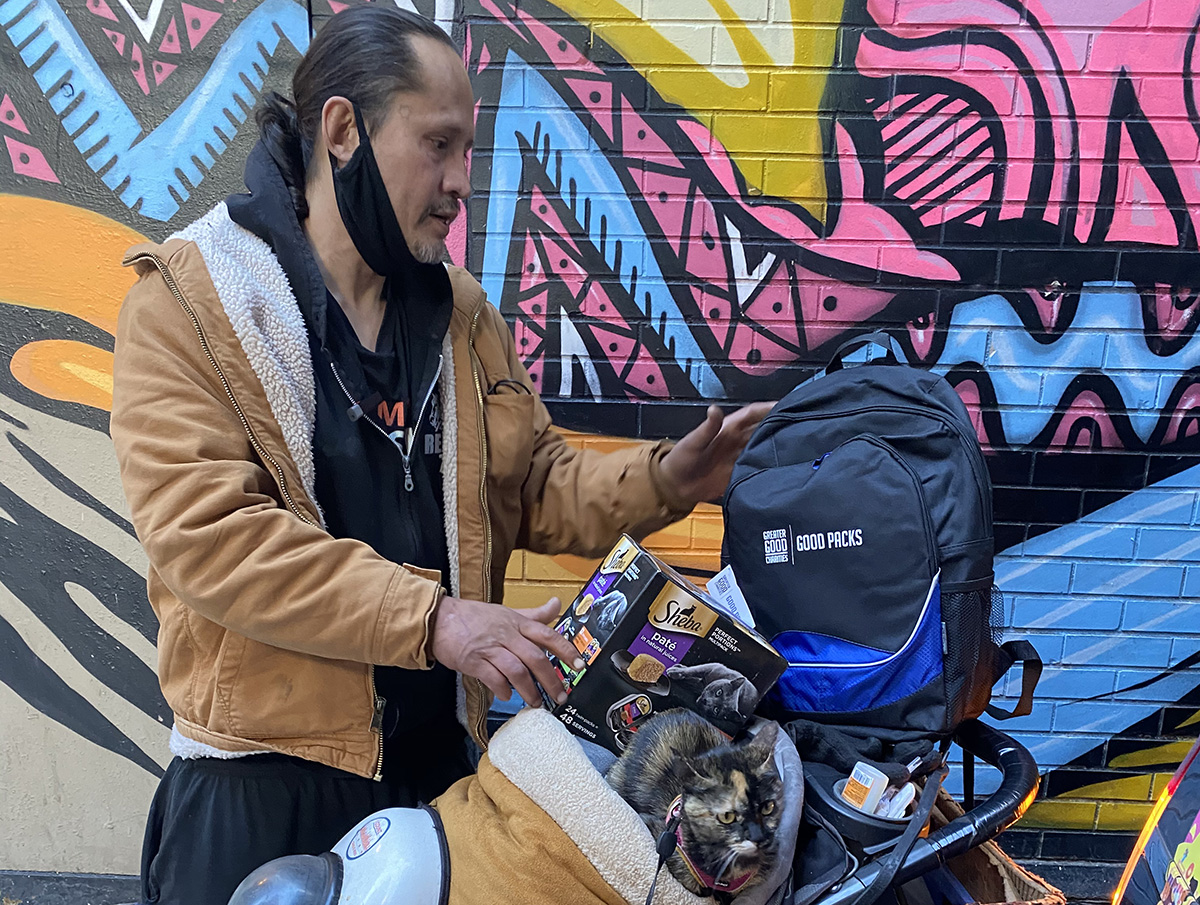 Man with Good Pack in Stroller with Cat and Supplies_©Paw Salvation-1